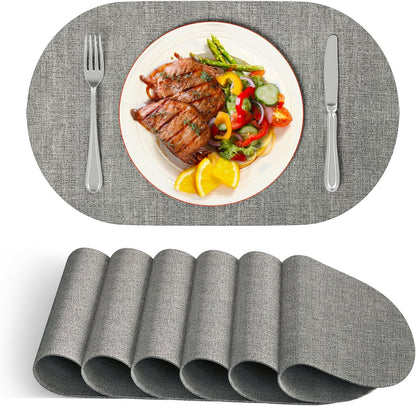 DOLOPL Oval Placemats Set of 6, Gray Faux Leather Heat Resistant Table Mats - Anti Slip Table Place Mats, Washable Wipeable Outdoor Placemats for Kitchen Dining Room Table Decorations(13.8"x21.6")