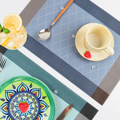 CADONO Placemats Set of 6 Washable Indoor/Outdoor Vinyl Place Mats for Dining Table Durable Non-Slip Heat Resistant PVC Weave Table Mats（Rhombus-Blue）